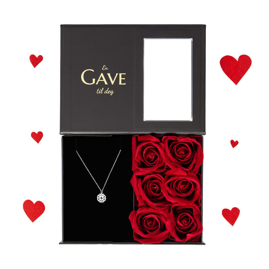 Gave til kjæresten med hjertesmykke med røde roser. Pakket i en elegant gaveeske fra Boxit.