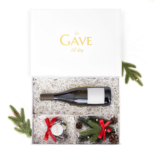 Vingave levert i en elegant hvit gaveeske med sjokolader og juledekor. Passer som julegave, bedriftsgave, bursdagsgave, vertinnegave.