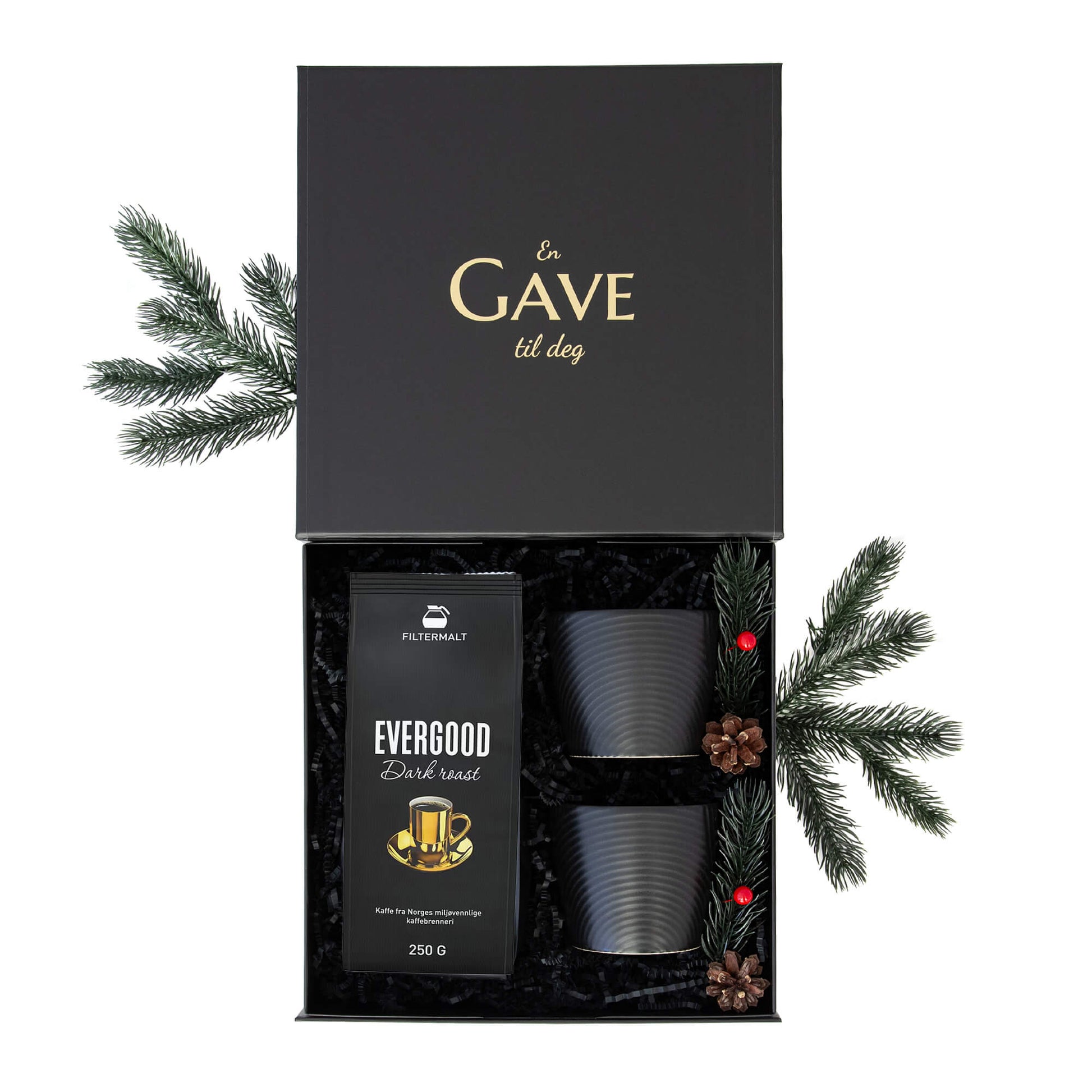 Julegave til han eller henne med kaffe og svarte kopper. Alt i en elegant åpen svart gaveeske.