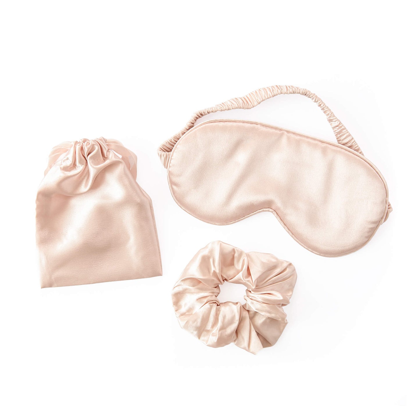 Sovemaske, hårstrikk og oppbevaringspose i mykt sateng materiale i fargen beige