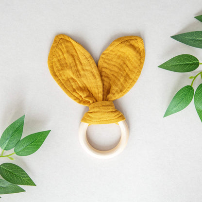 Babyrangle i tre og bomull fra Boxit i fine farger.