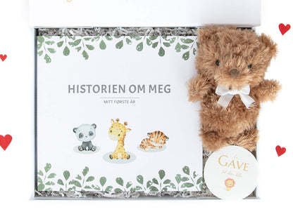 Gaveeske med babyjournalen "En historie om meg" som tar for seg den nyfødtes første år og en super koselig kosebamse.
