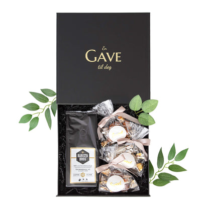 Fellesgave med deilige sjokolader og brasiliansk kaffe. Pent pakket i en sort gaveeske med gullskrift.