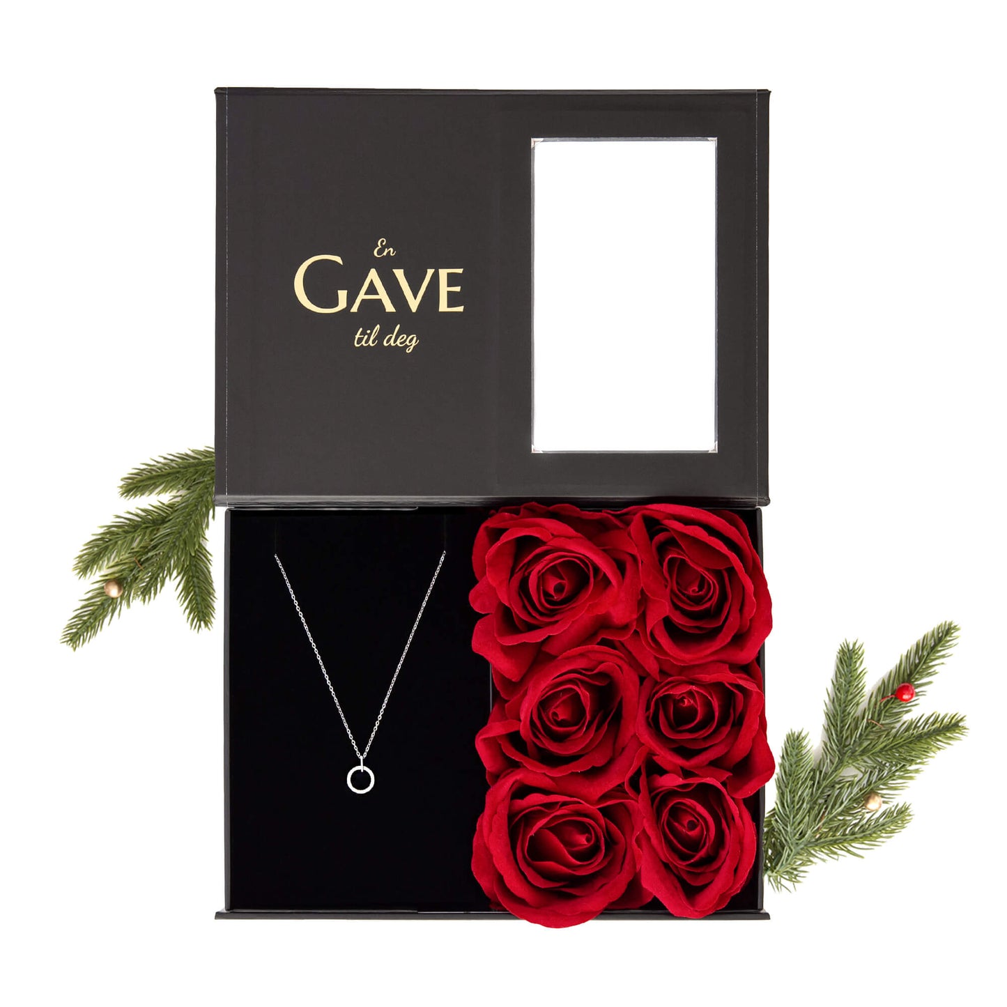 Julegave til henne med smykke i sølv og vakre røde roser. Alt i en elegant åpen svart gaveeske.