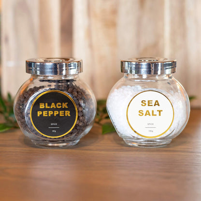 Pepper og salt beholdere med gull logo